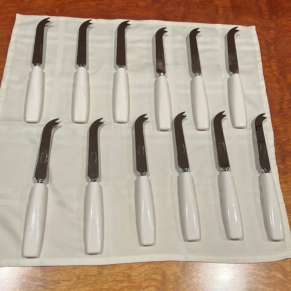 Set of 12 Sheffield England Curved Tip Knife Knives White Ceramic Handle